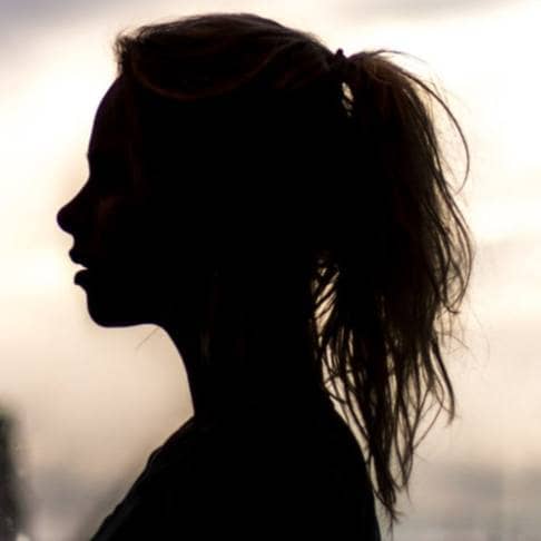 silhouette of young teen girl